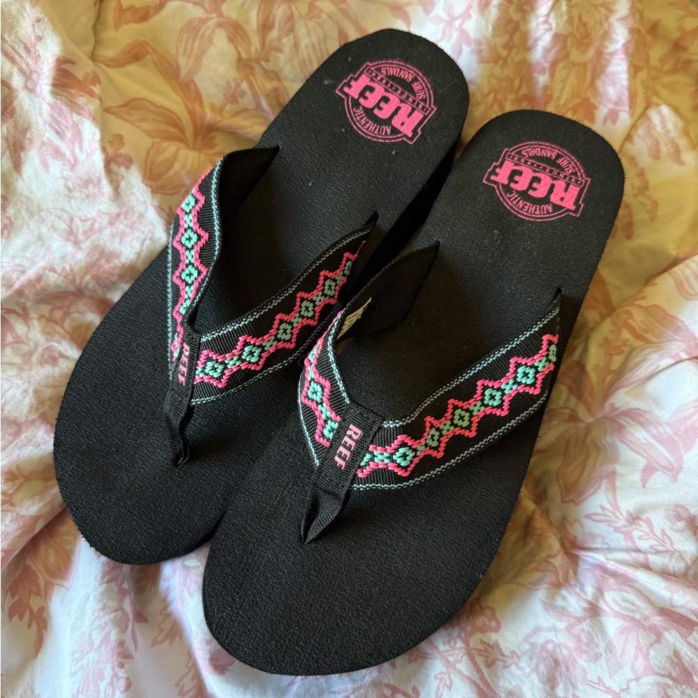 Reef Black Flip Flops with Pink Accents